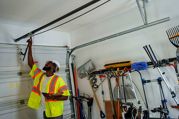 Professional Garage Door Panel Replacement technician working in Anderson County County, TX